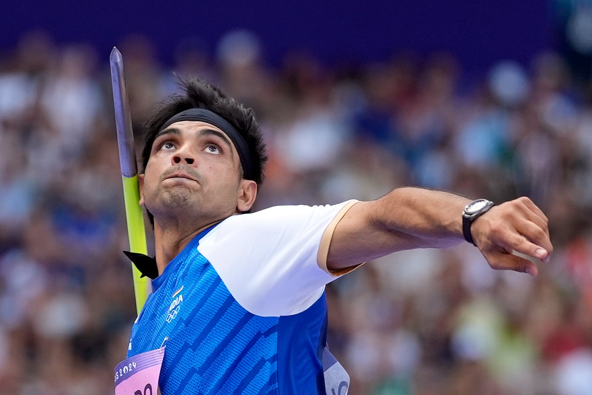 Neeraj Chopra, of India, competes during the men's javelin throw qualification at the 2024 Summer Olympics, Tuesday, Aug. 6, 2024, in Saint-Denis, France. 
 - (AP Photo/Matthias Schrader)
